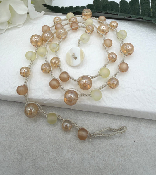 Crocheted Necklace with a Cream Cord, Frosted Cream and Gold Glass and Gold AB Glass Beads SN-709