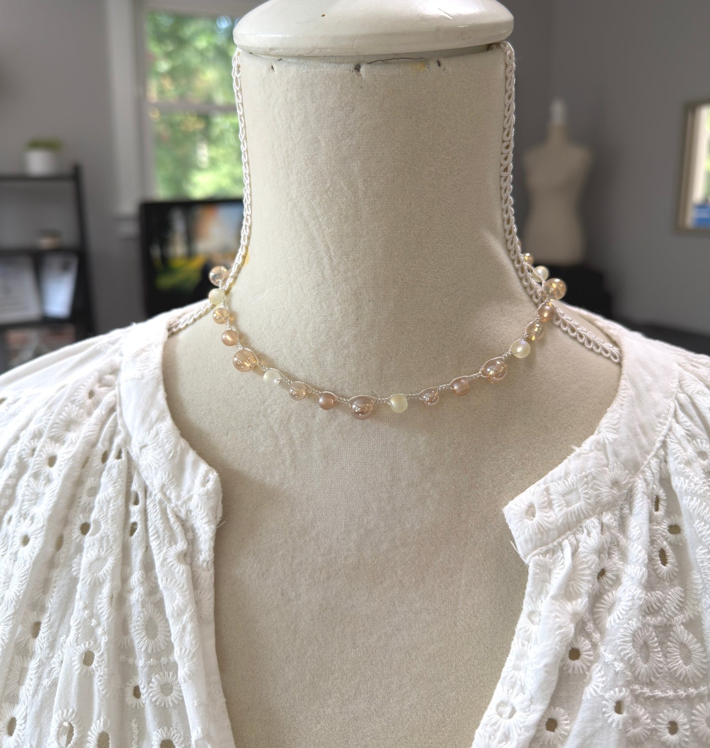 Crocheted Necklace with a Cream Cord, Frosted Cream and Gold Glass and Gold AB Glass Beads SN-709