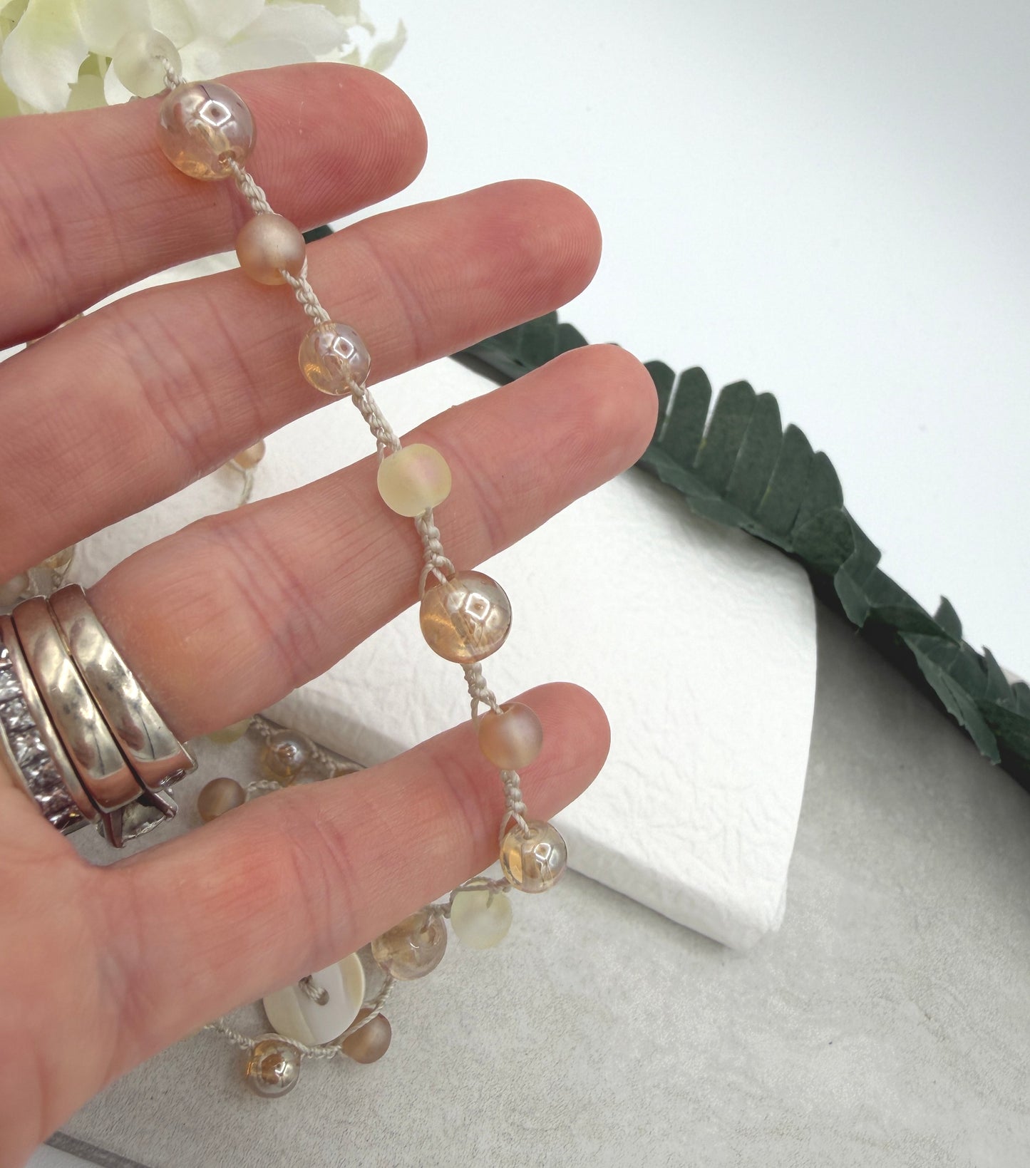 Crocheted Necklace with a Cream Cord, Frosted Cream and Gold Glass and Gold AB Glass Beads SN-709