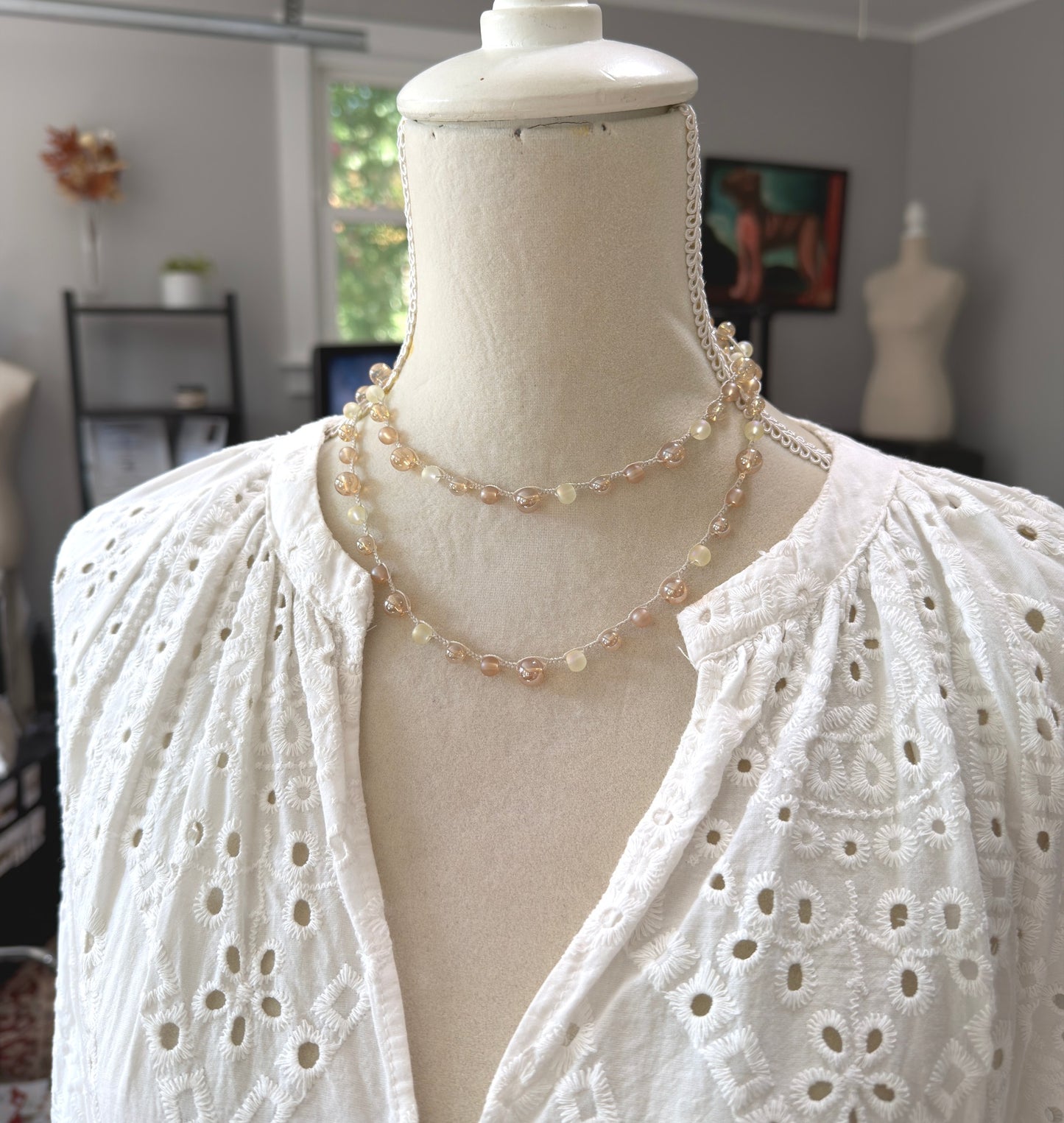 Crocheted Necklace with a Cream Cord, Frosted Cream and Gold Glass and Gold AB Glass Beads SN-709