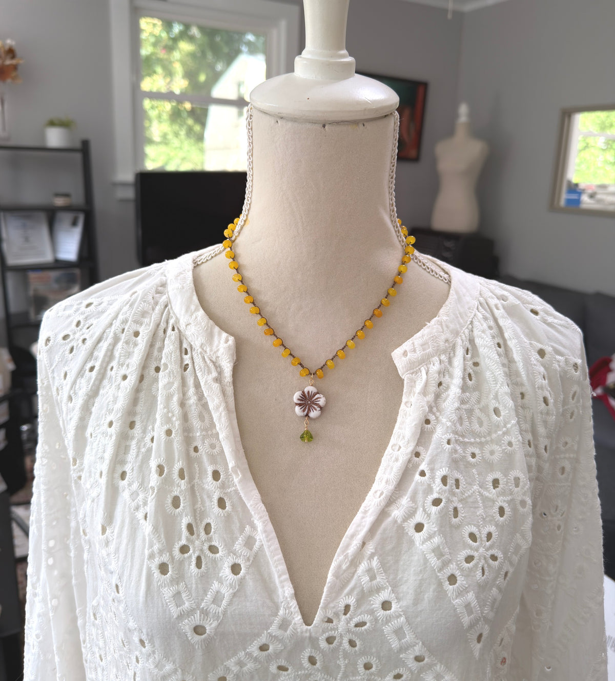 Crocheted Necklace with a Brown Cord, Yellow Jade Rondelles, a White Czech Flower and Green Leaf SN-710