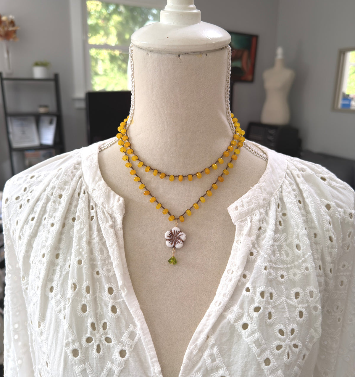 Crocheted Necklace with a Brown Cord, Yellow Jade Rondelles, a White Czech Flower and Green Leaf SN-710