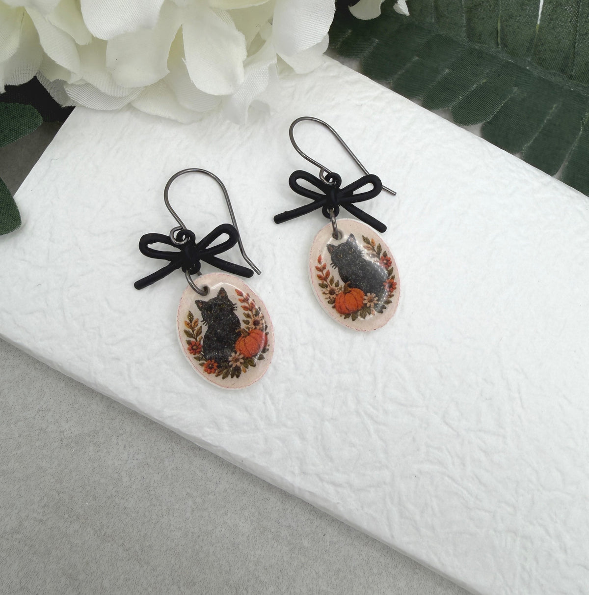 Earrings Made with Black Bow LInks and Polymer Clay Ovals with a Black Cat Design and Oxidized Silver Earring Wires PCE-1081