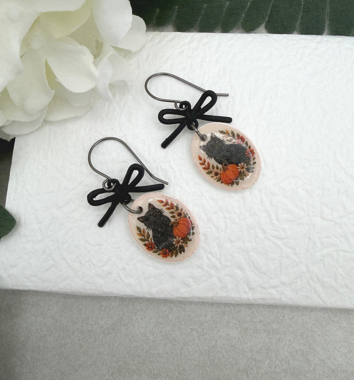Earrings Made with Black Bow LInks and Polymer Clay Ovals with a Black Cat Design and Oxidized Silver Earring Wires PCE-1081