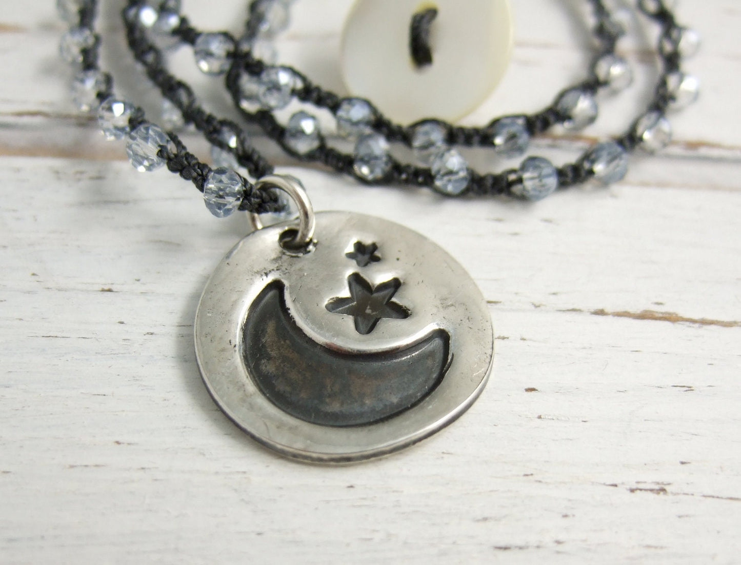 Crocheted Necklace with a Dark Gray Cord, Blue AB Crystal Beads and a Round, PMC Pendant with a Moon and Stars Design SN-427