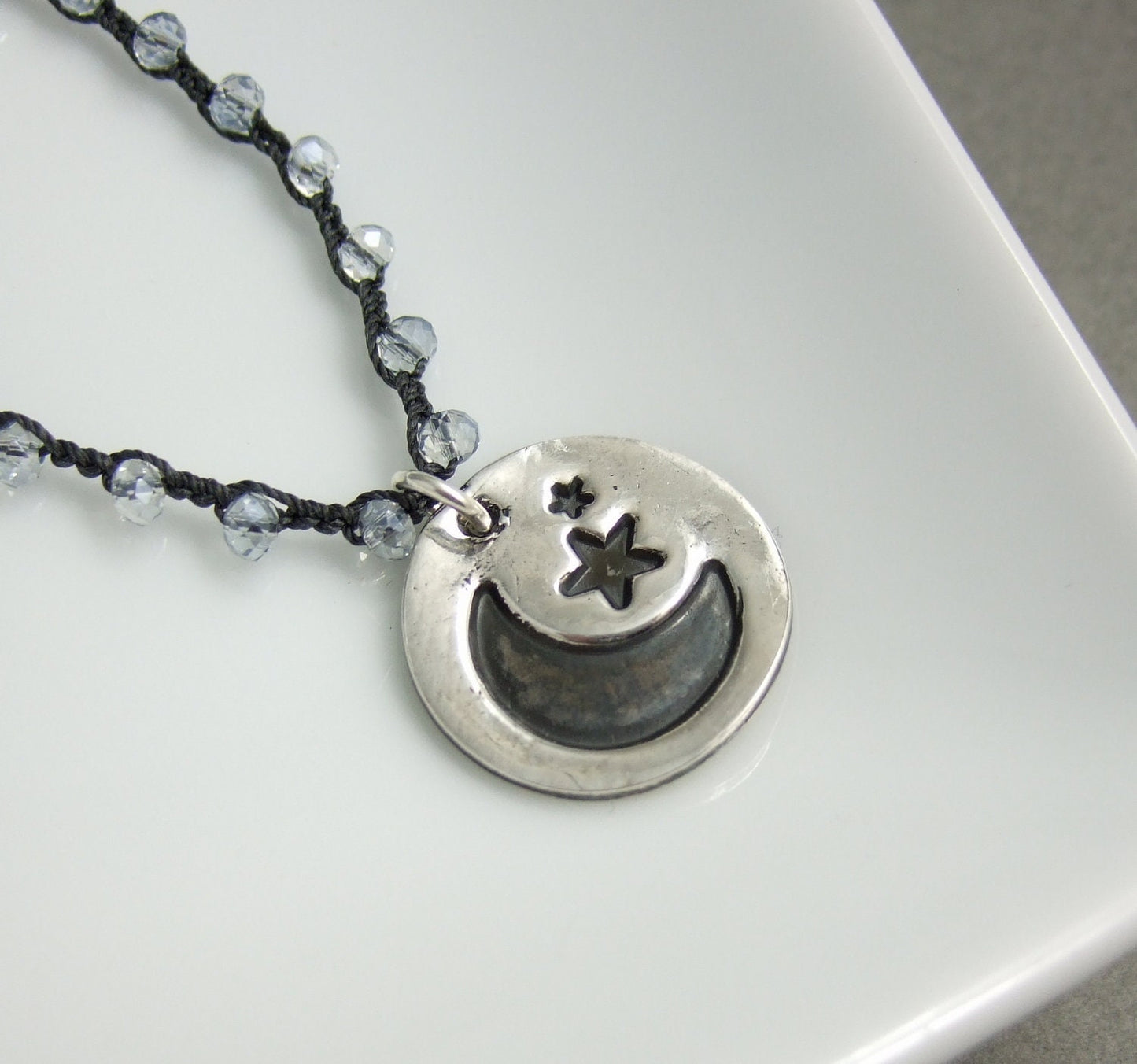 Crocheted Necklace with a Dark Gray Cord, Blue AB Crystal Beads and a Round, PMC Pendant with a Moon and Stars Design SN-427