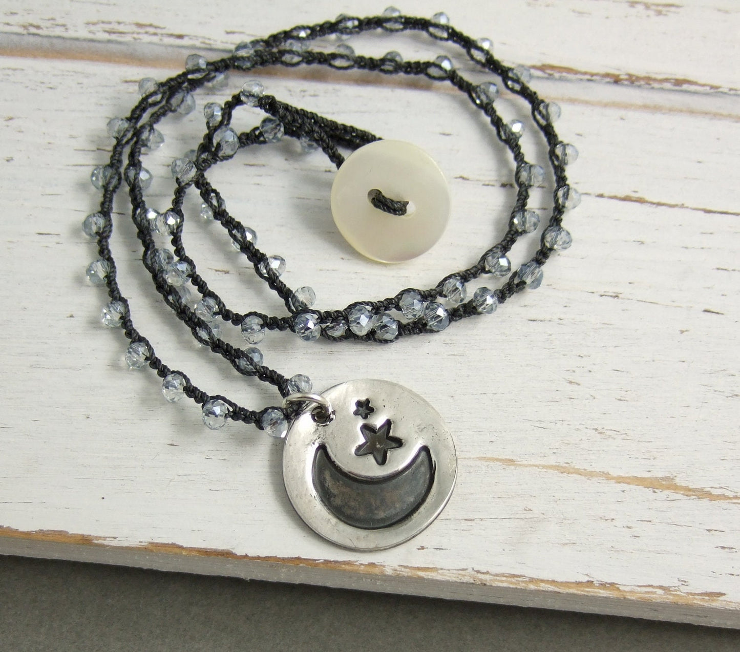 Crocheted Necklace with a Dark Gray Cord, Blue AB Crystal Beads and a Round, PMC Pendant with a Moon and Stars Design SN-427