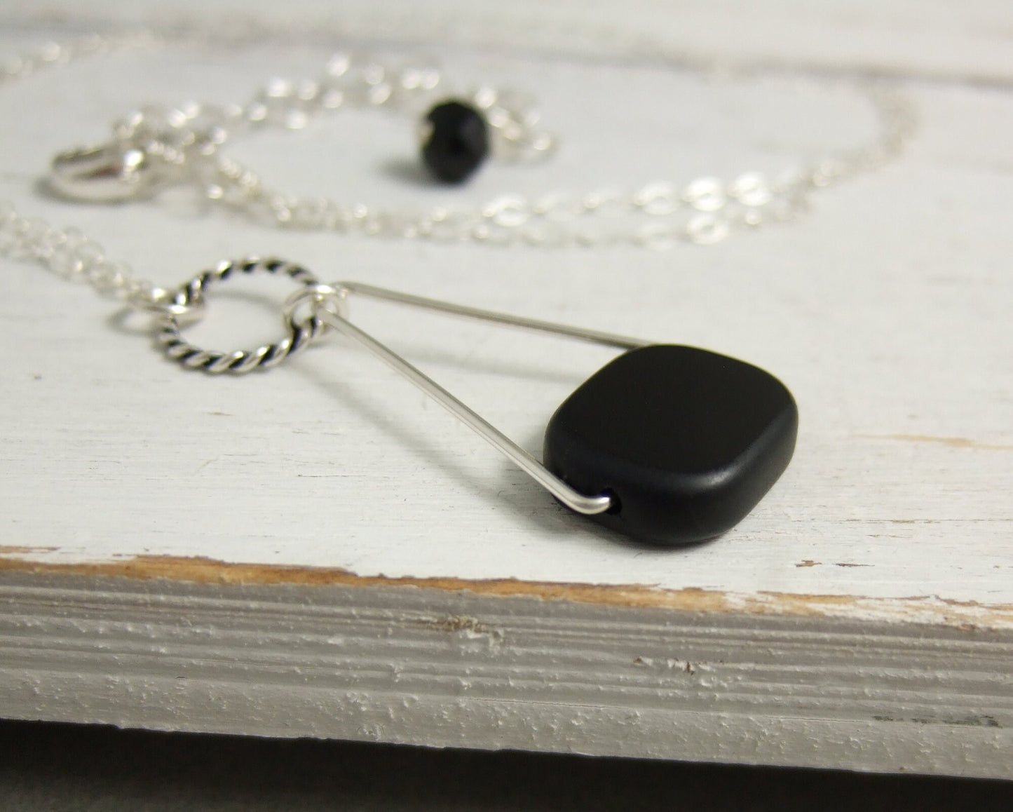 Necklace with a Black, Rectangular Glass Bead Wire Wrapped with Sterling Silver Wire to a Sterling Silver Oxidized Loop and Triangle CDN-779