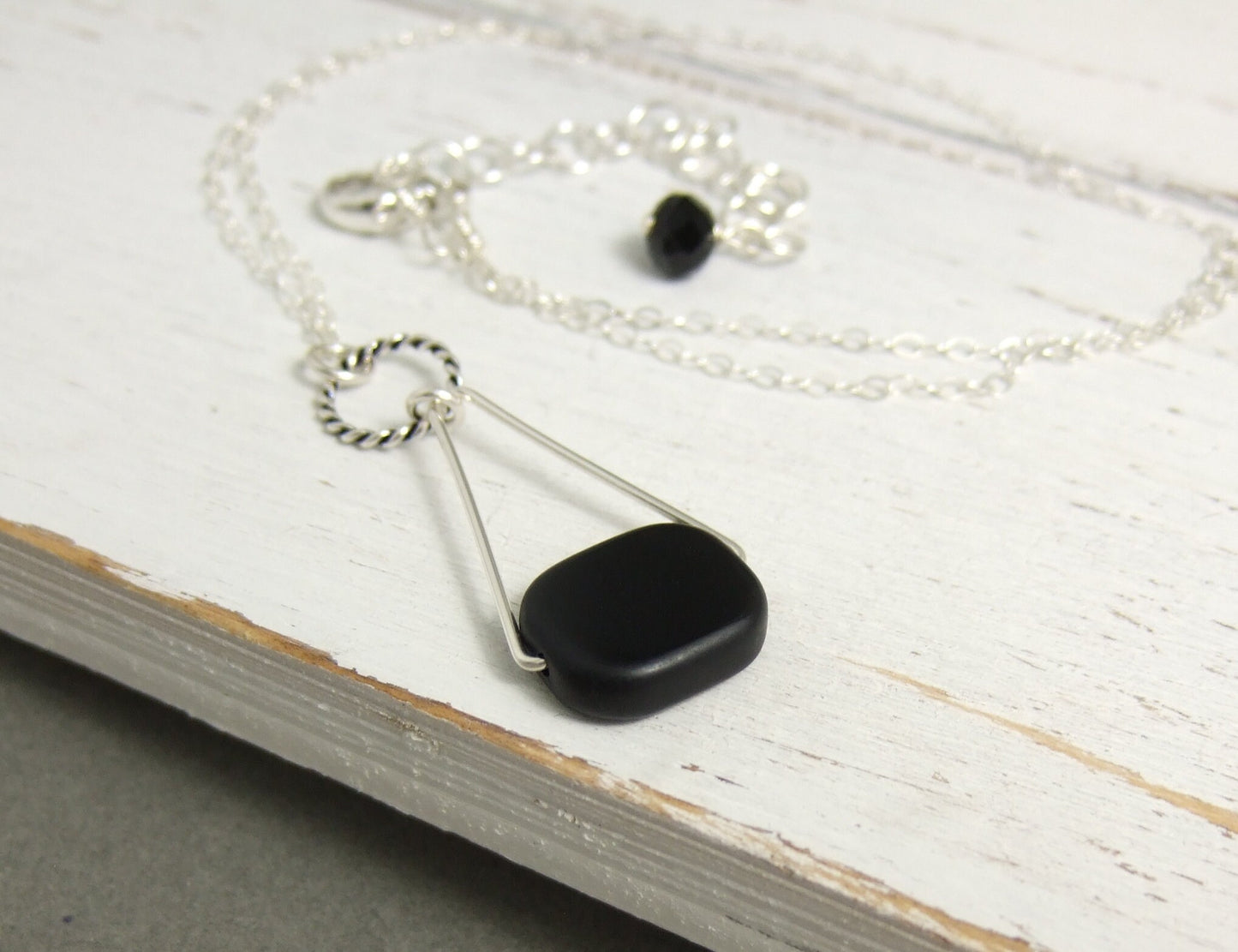 Necklace with a Black, Rectangular Glass Bead Wire Wrapped with Sterling Silver Wire to a Sterling Silver Oxidized Loop and Triangle CDN-779