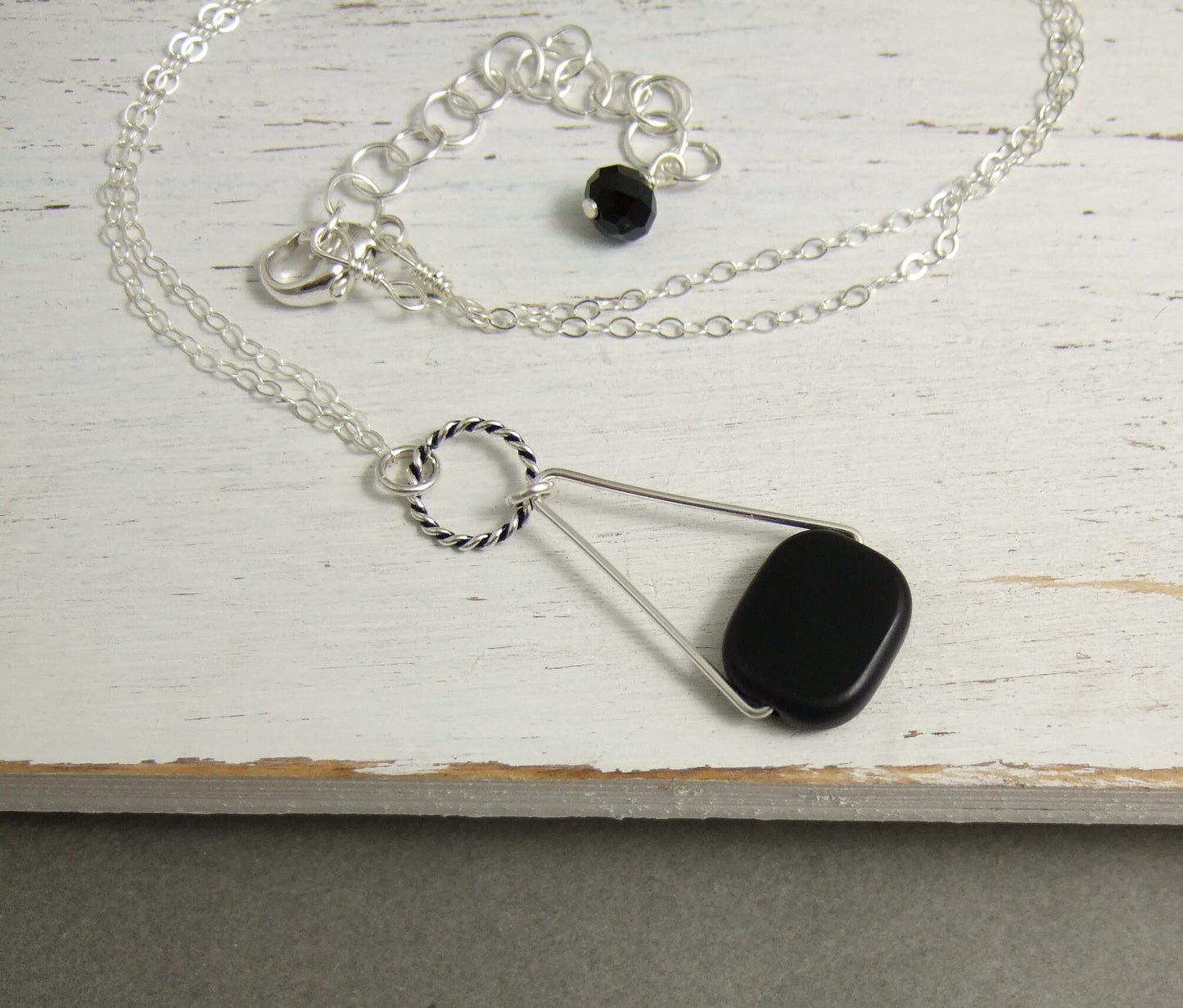 Necklace with a Black, Rectangular Glass Bead Wire Wrapped with Sterling Silver Wire to a Sterling Silver Oxidized Loop and Triangle CDN-779