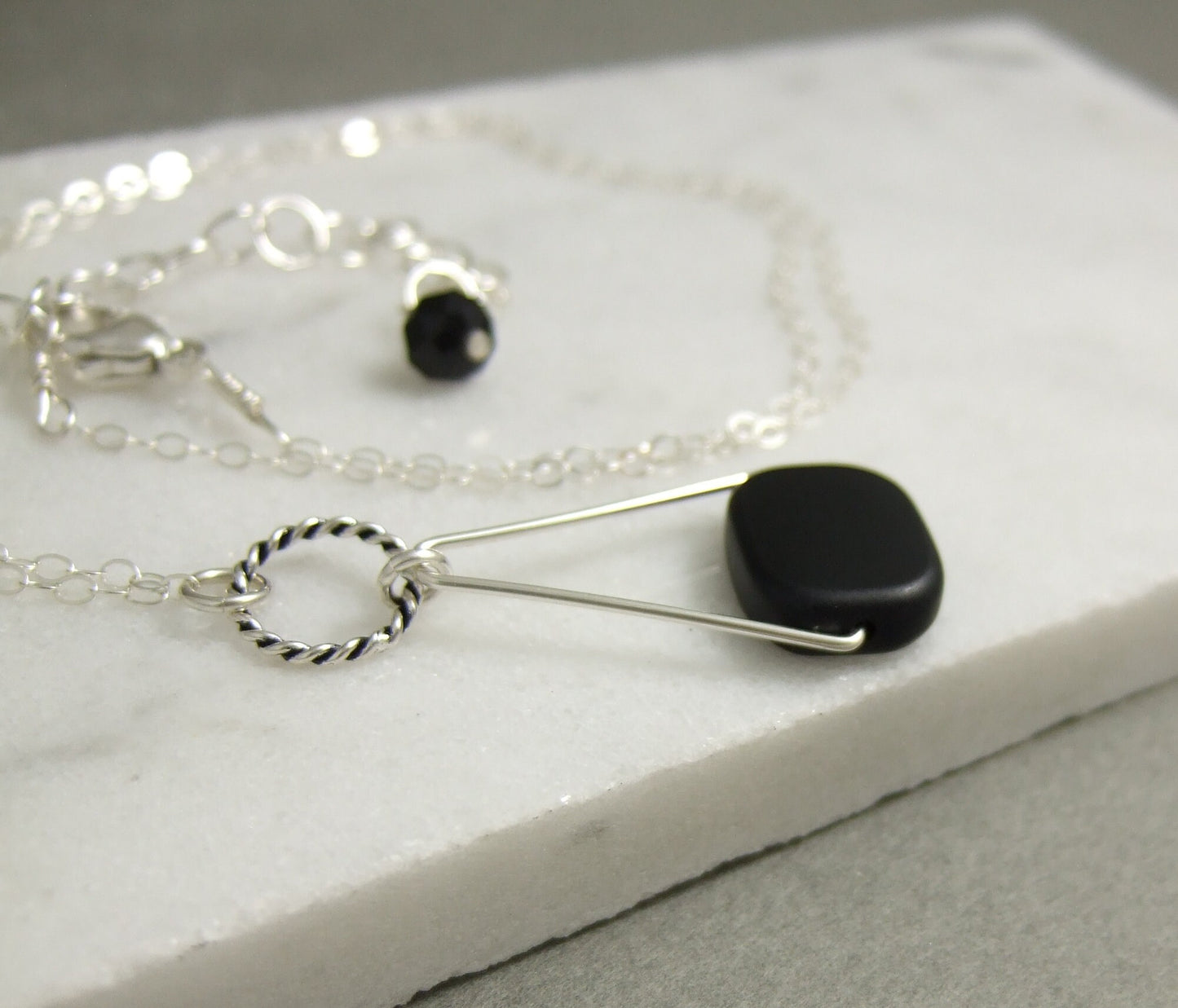 Necklace with a Black, Rectangular Glass Bead Wire Wrapped with Sterling Silver Wire to a Sterling Silver Oxidized Loop and Triangle CDN-779