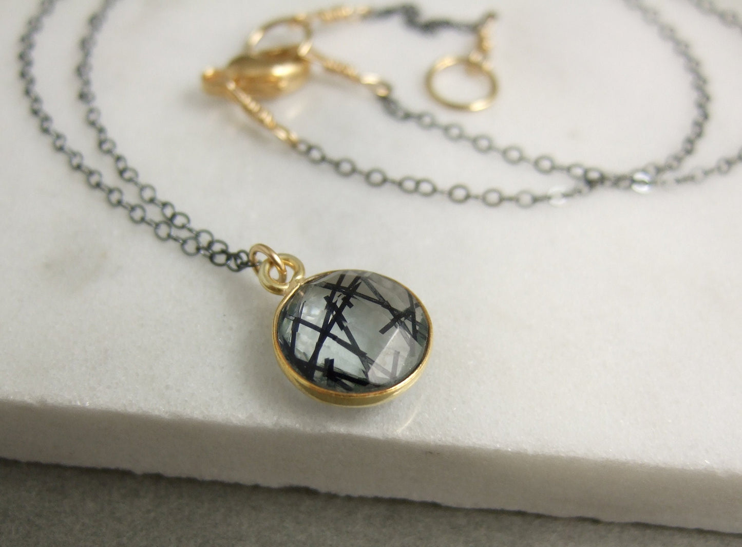 Necklace with a Gold, Bezel Set Rutilated Quartz on an Oxidized, Sterling Silver Cable Chain GCDN-109