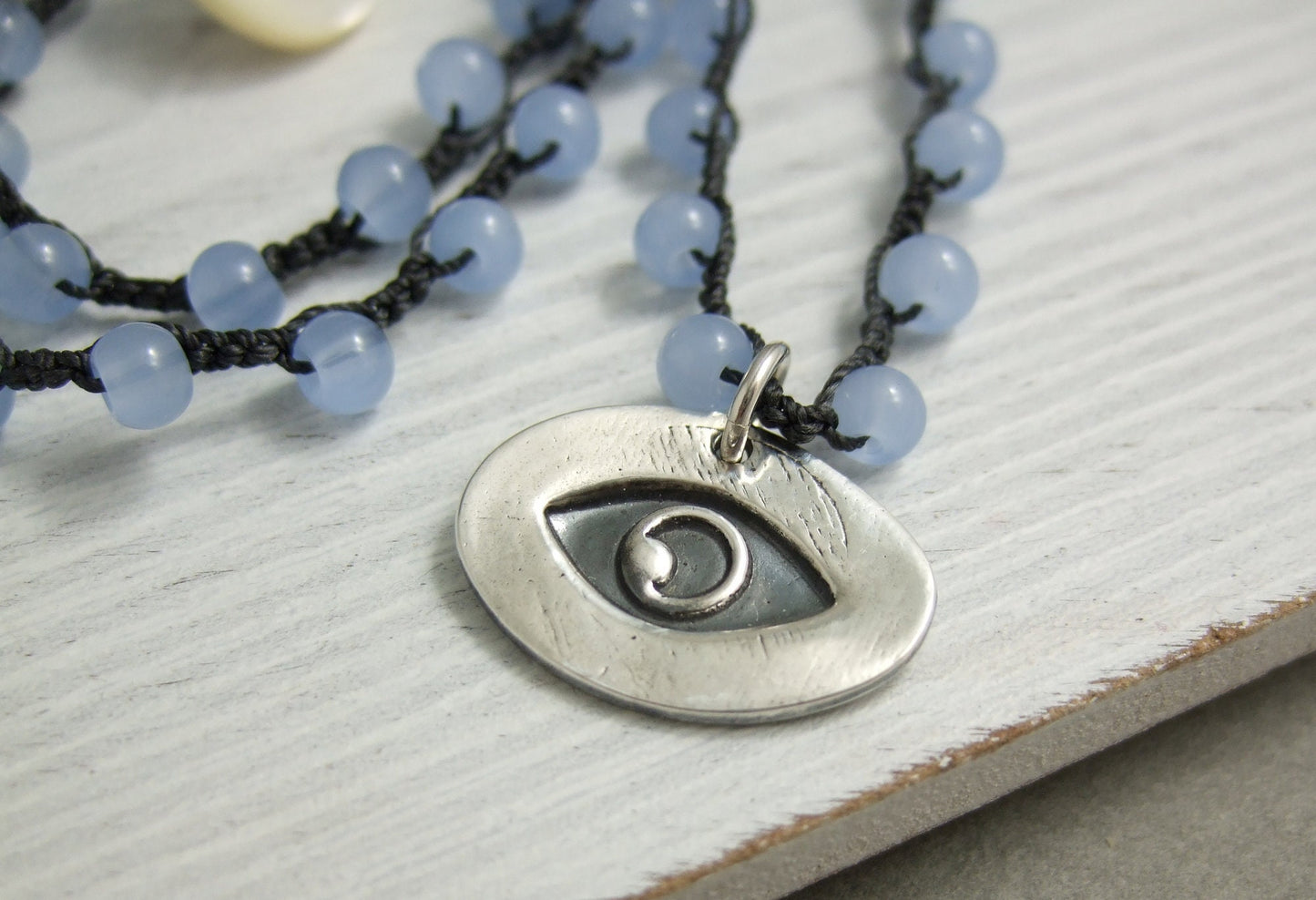 Crocheted Necklace with a Dark Gray Cord, Blue Glass Beads and an Oval, PMC Pendant with an Eye SN-567