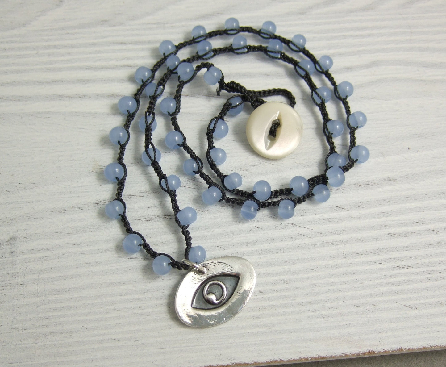 Crocheted Necklace with a Dark Gray Cord, Blue Glass Beads and an Oval, PMC Pendant with an Eye SN-567