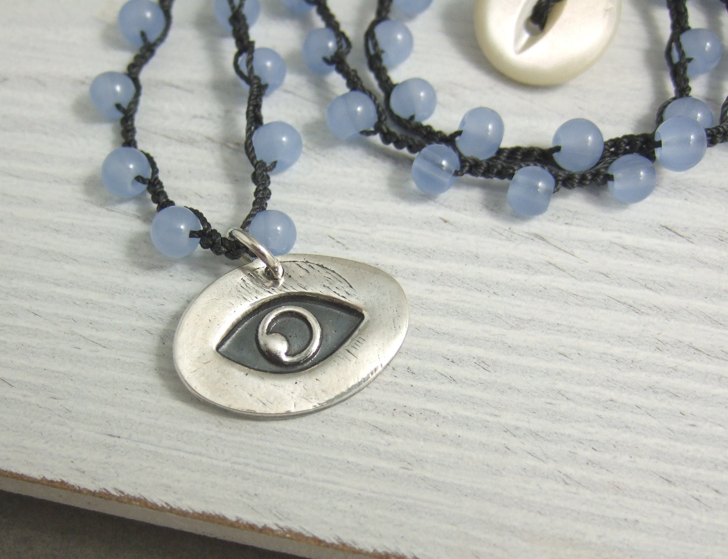 Crocheted Necklace with a Dark Gray Cord, Blue Glass Beads and an Oval, PMC Pendant with an Eye SN-567