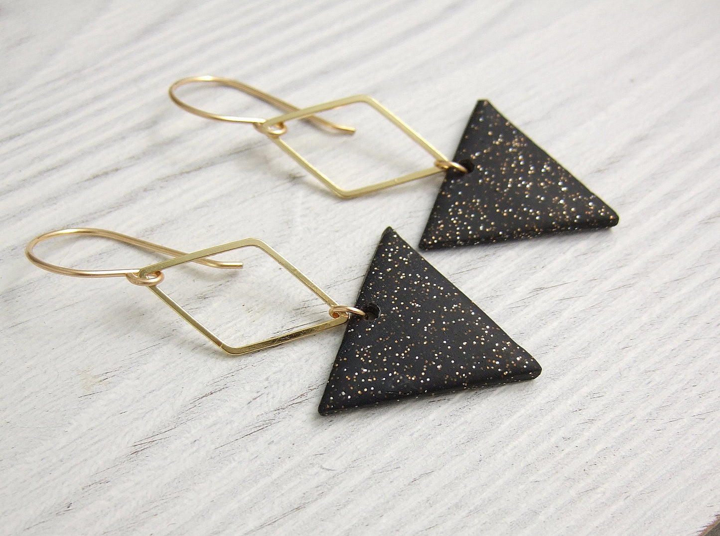 Earrings made with Triangles of Sparkly, Black Polymer Clay and Brass Diamonds on 14k Gold Filled Earring Wires PCE-84
