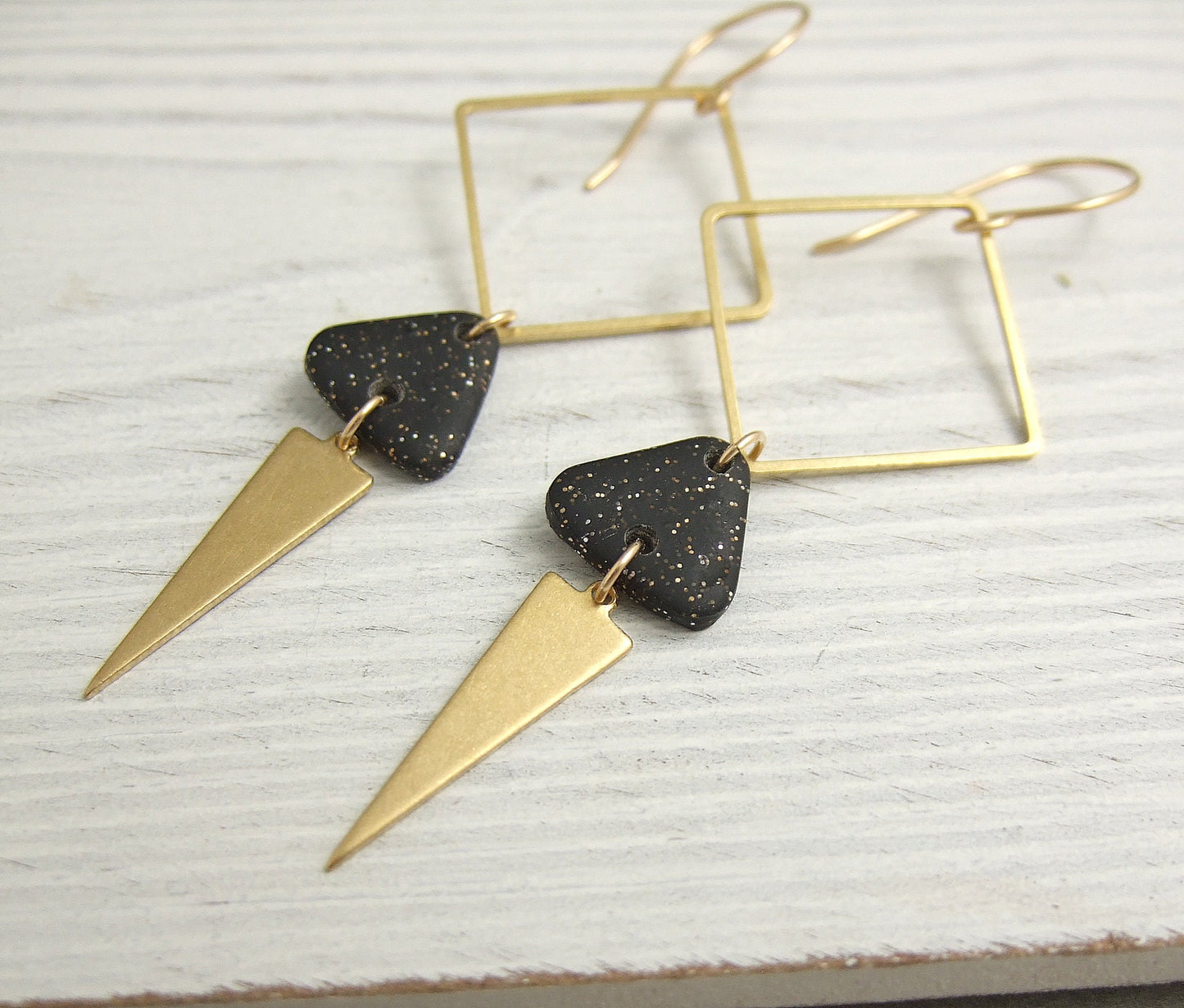 Earrings made with Triangles of Sparkly, Black Polymer Clay, Brass Triangles and Brass Squares on 14k Gold Filled Earring Wires PCE-59