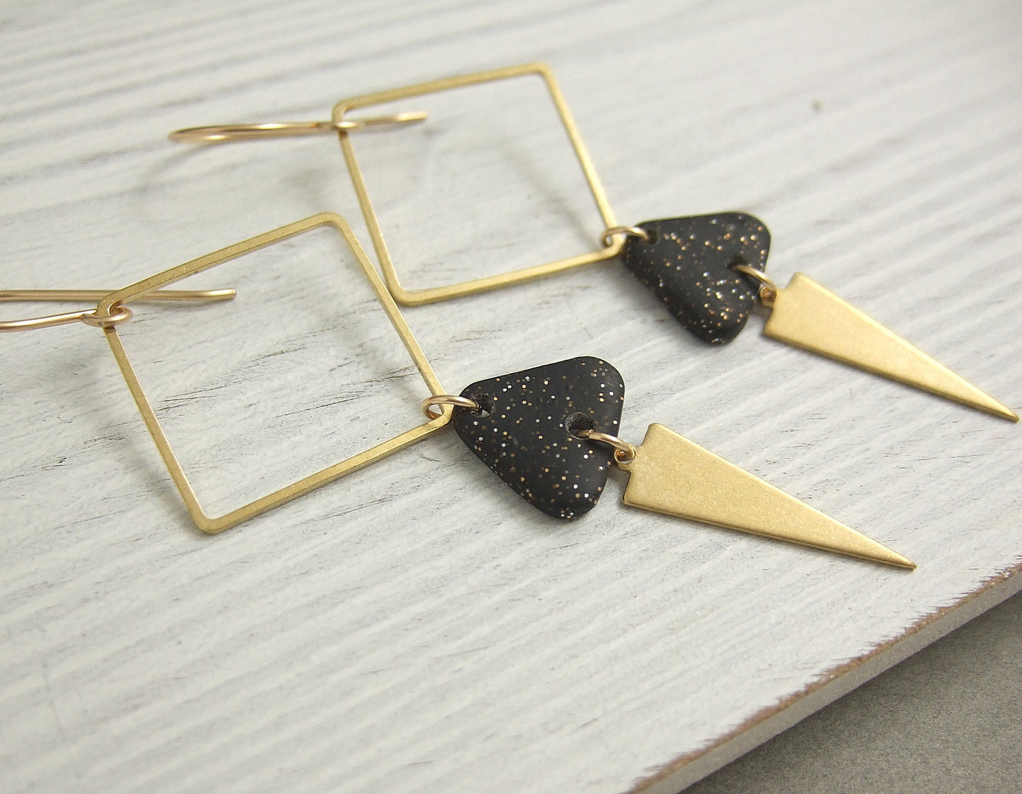 Earrings made with Triangles of Sparkly, Black Polymer Clay, Brass Triangles and Brass Squares on 14k Gold Filled Earring Wires PCE-59