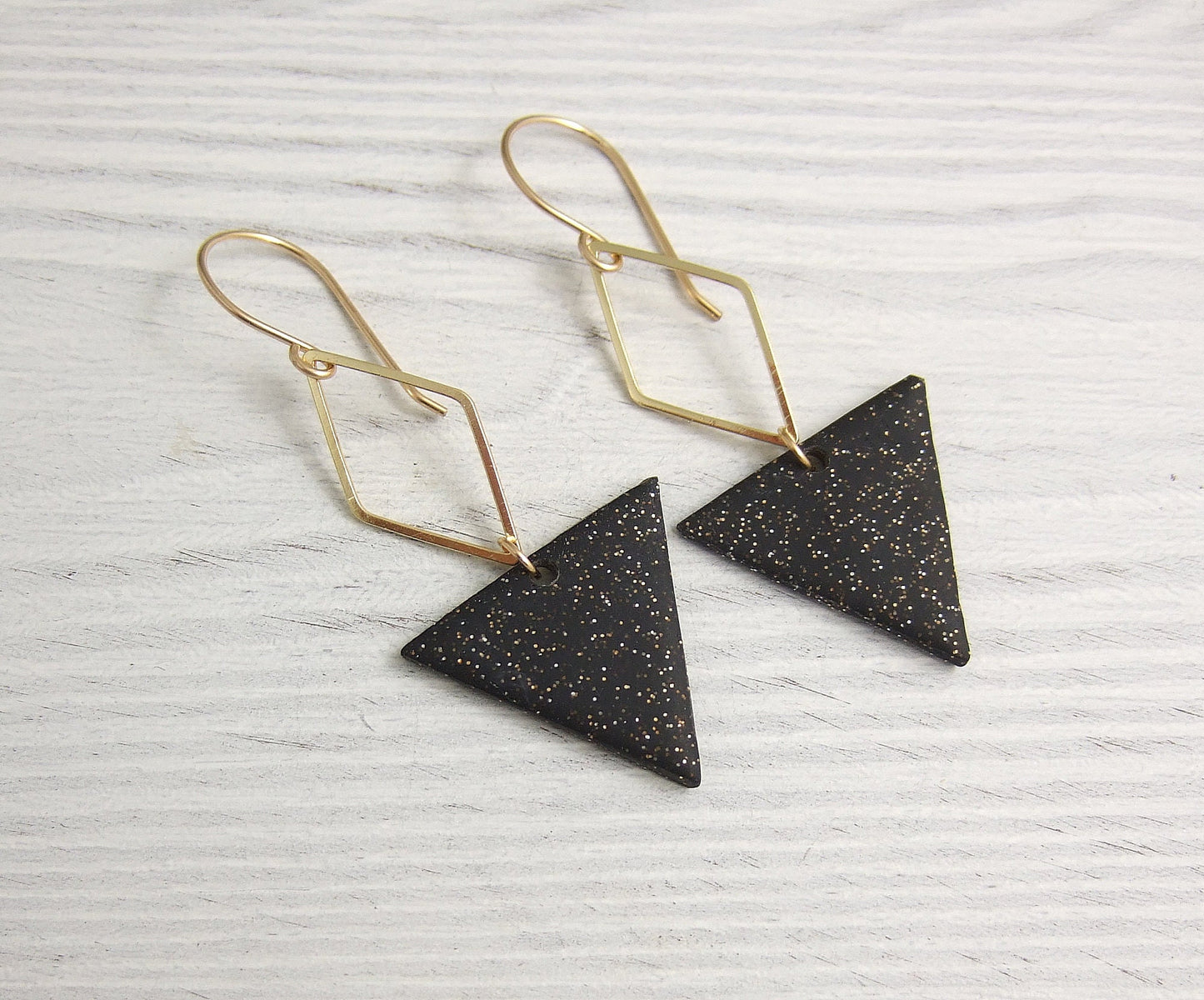 Earrings made with Triangles of Sparkly, Black Polymer Clay and Brass Diamonds on 14k Gold Filled Earring Wires PCE-84