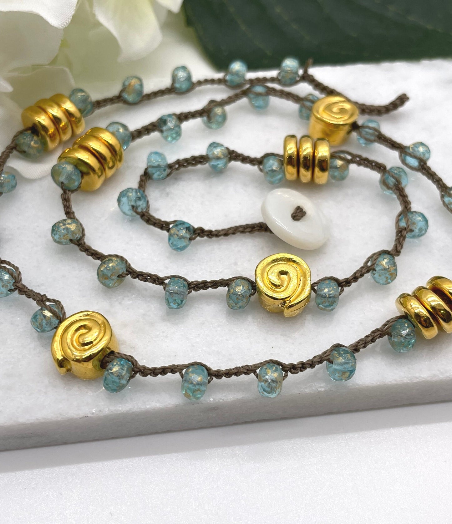 Crocheted Necklace 19 Inches with a Brown Cord, Aqua and Gold Czech Glass Beads and Gold Coated Mykonos Beads SN-607