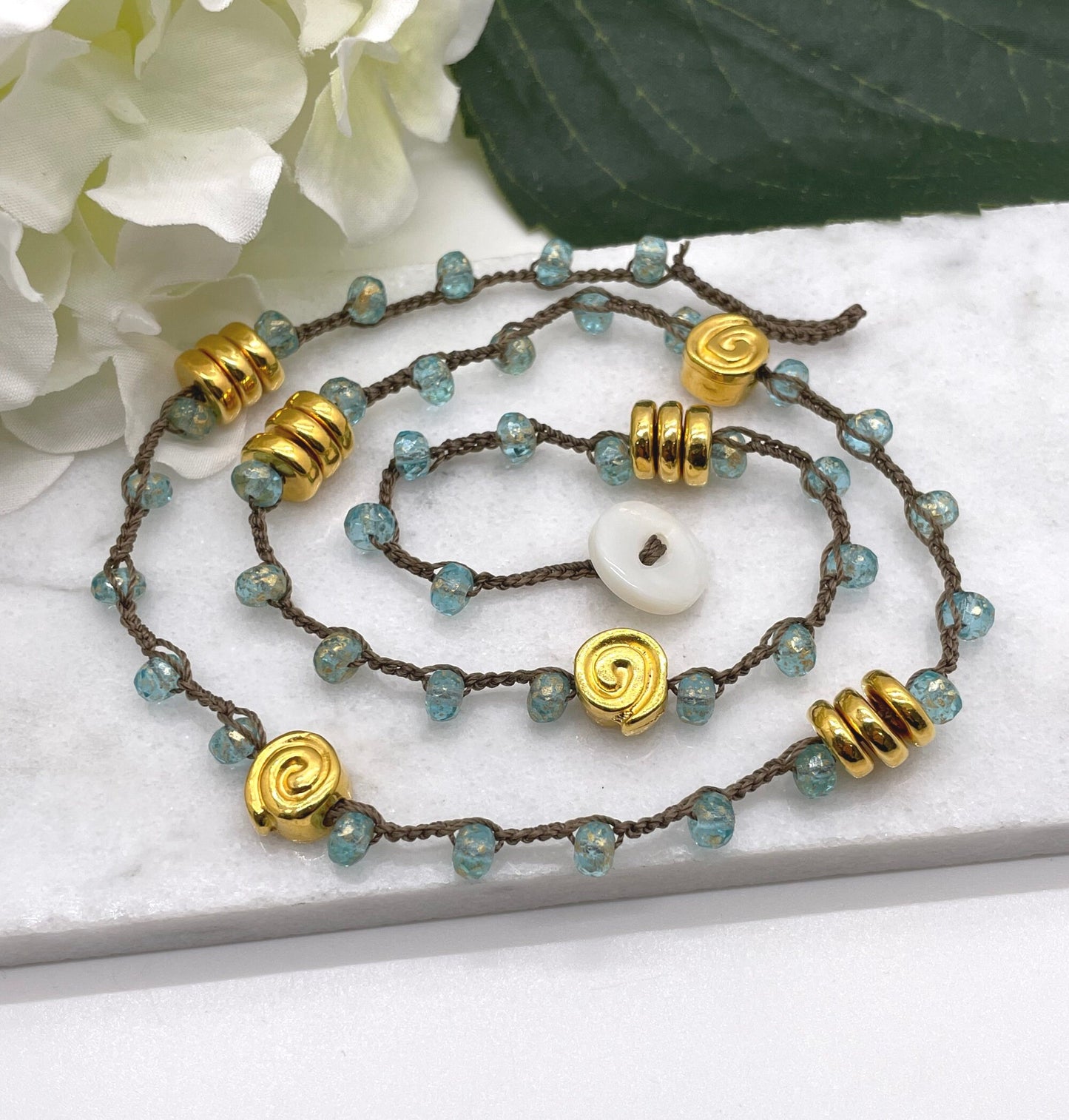 Crocheted Necklace 19 Inches with a Brown Cord, Aqua and Gold Czech Glass Beads and Gold Coated Mykonos Beads SN-607