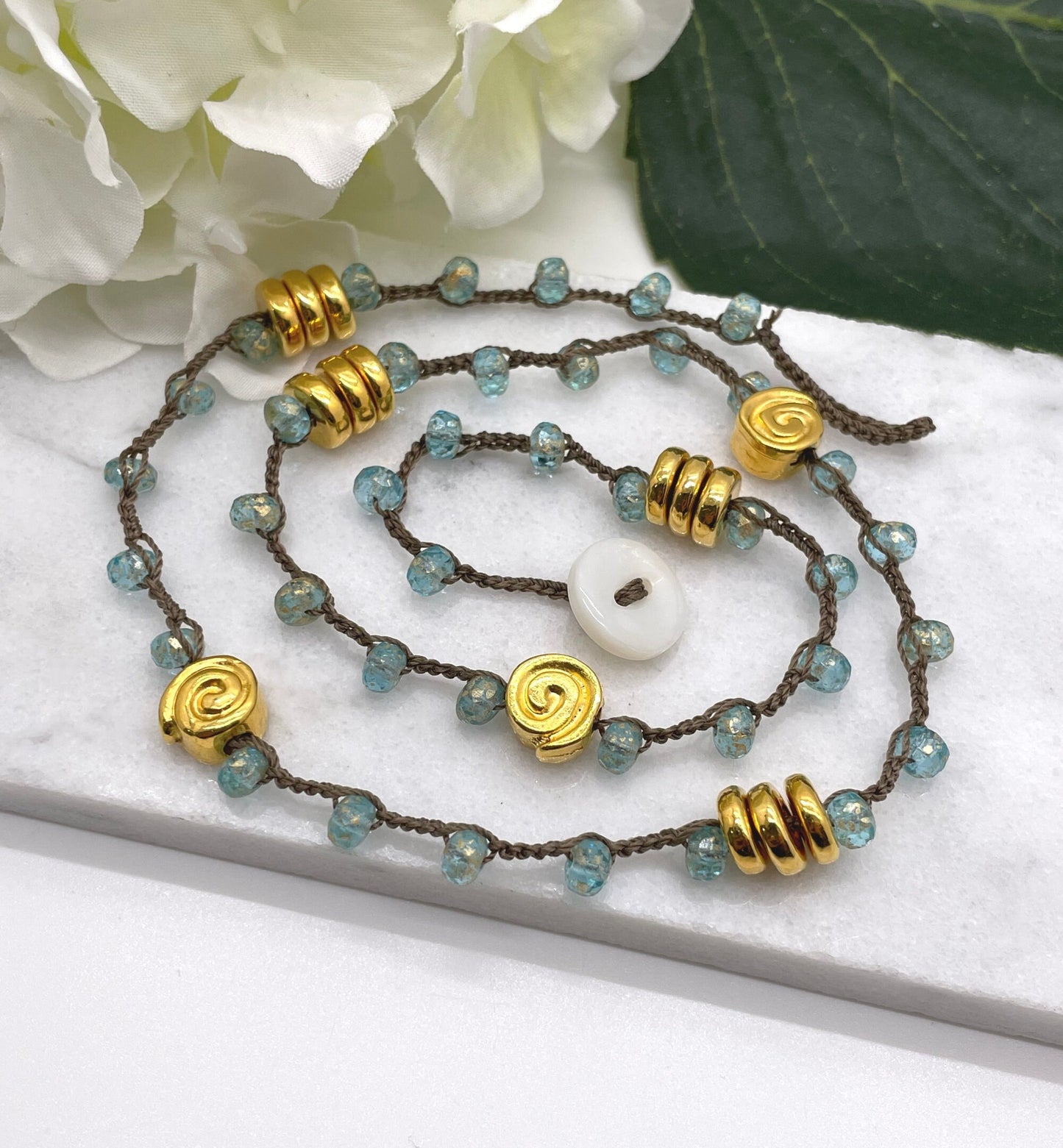 Crocheted Necklace 19 Inches with a Brown Cord, Aqua and Gold Czech Glass Beads and Gold Coated Mykonos Beads SN-607