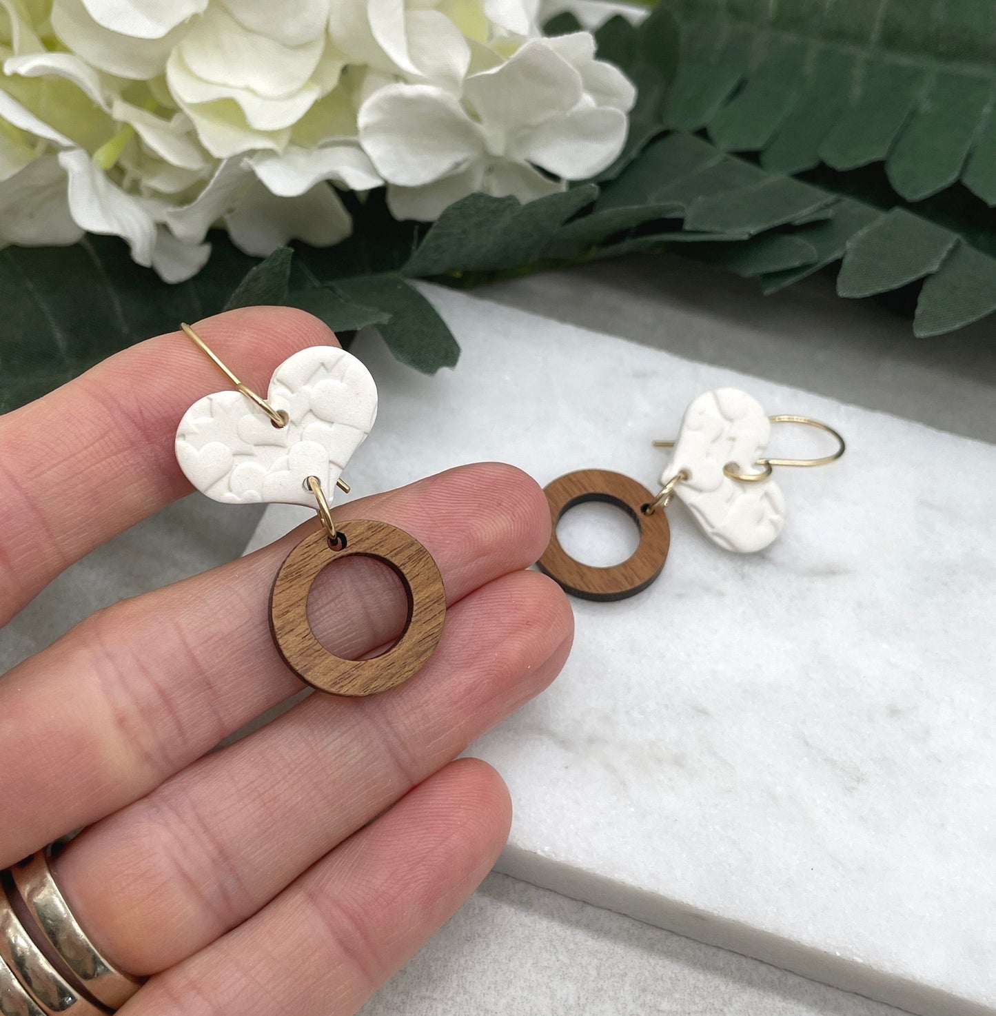Earrings made with White Polymer Clay Hearts Textured with Hearts and Wood Circles on Gold Filled Earring Wires PCE-613